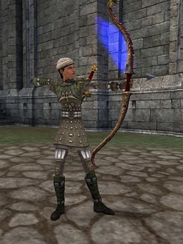 In-game screenshot: an Albion archer drawing an ornate red longbow on the cobblestones in front of a stone keep